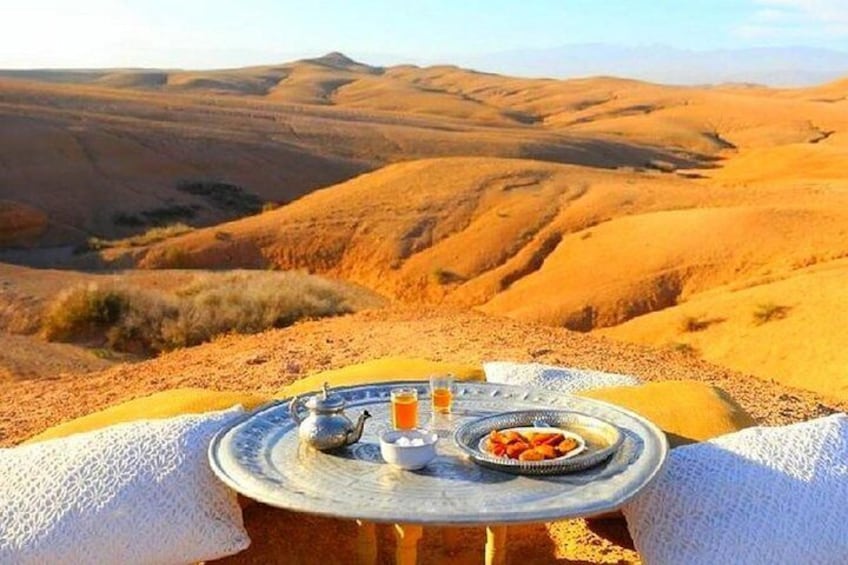Magical Dinner in Marrakech Desert and camel ride at sunset with Transportation